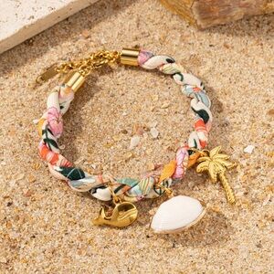 Gold Charm Bracelet with Intricate Designs